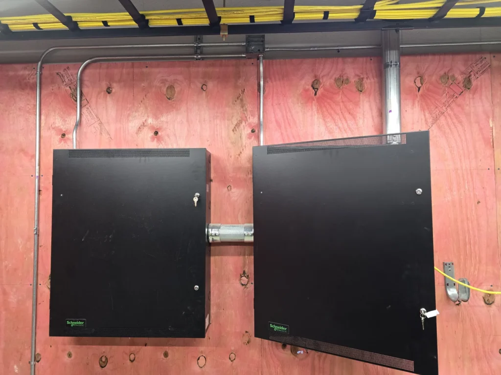 WiredOptics access control panels and labeled low-voltage wiring for a Clarksville commercial property