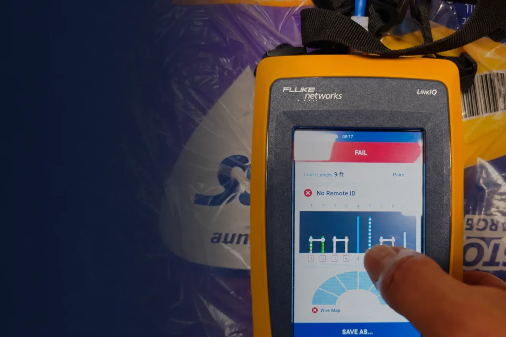 WiredOptics testing an Ethernet cable with a Fluke LinkIQ showing a failed wire-map result.